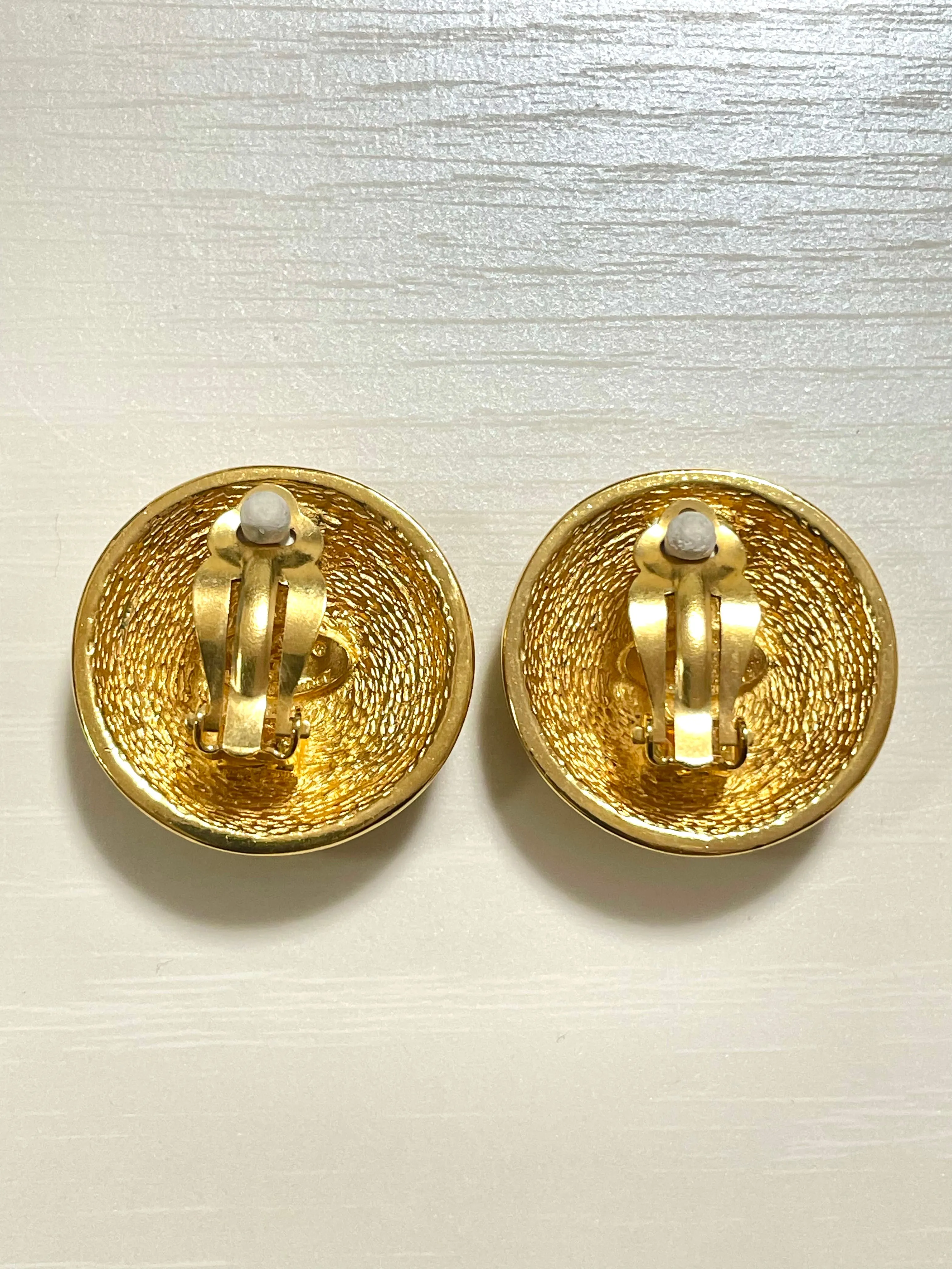 Vintage CHANEL gold tone matelasse round earrings with CC mark. Classic vintage Chanel jewelry. 070217ys1
